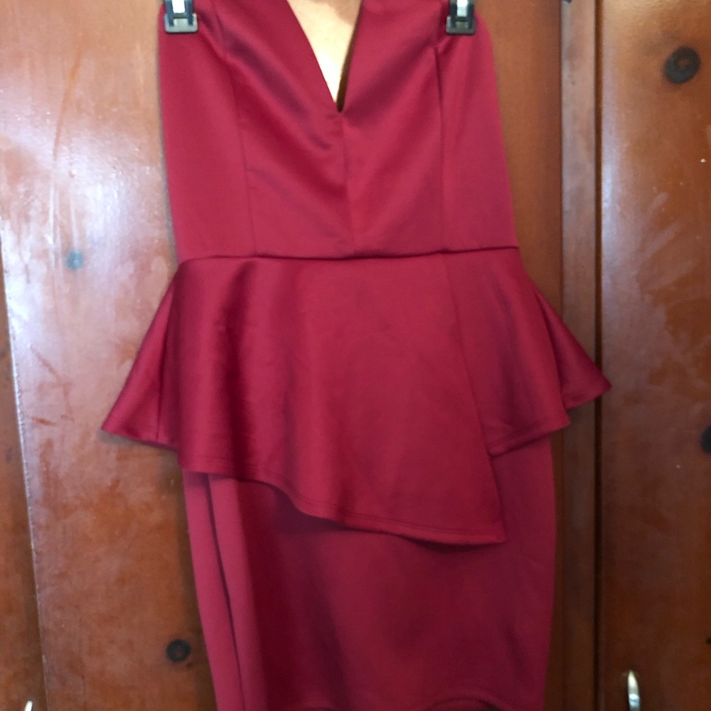 New. Removed the tags. Red fitted dress.